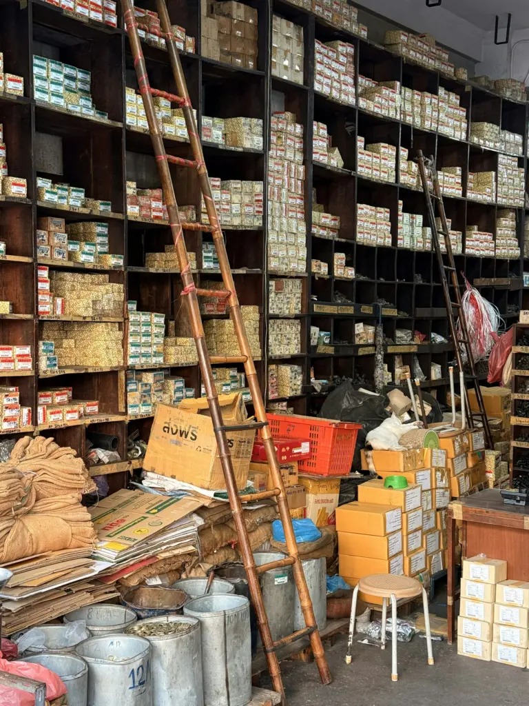 A hardware store in Bangkok with shelves of boxed stock
